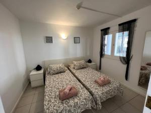 Posteľ alebo postele v izbe v ubytovaní Casa Perdy, beautiful 1 bedroom apartment with communal pool