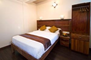 Tropic Tree Maldives客房内的一张或多张床位