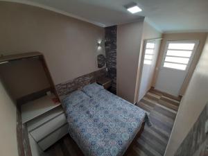 Katil atau katil-katil dalam bilik di Uma agradável morada para descansar em Itapirubá! +48 gambar