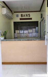 a bar in a store with a sign that reads loans at Bans Beach Resort in Boracay
