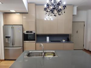 A kitchen or kitchenette at Luxury Living Athens by YHA