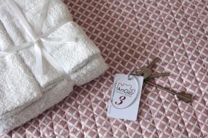 A bed or beds in a room at AnGiò holiday rooms