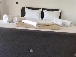 A bed or beds in a room at Luxury Living Athens by YHA