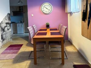 A seating area at ABT Apartments Karoly