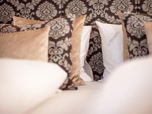 Postel nebo postele na pokoji v ubytování Alpen-Comfort-Hotel Central