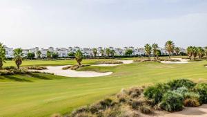 an aerial view of a golf course with palm trees at Modern Stunning Townhouse 3 bed 2 bath on La Torre CE51LT in Torre-Pacheco