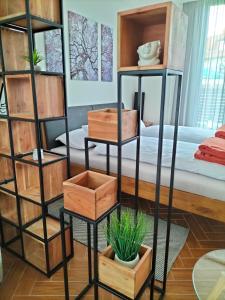 Łóżko lub łóżka w pokoju w obiekcie Sakura Studio Apartment