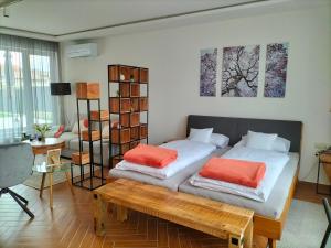 Posteľ alebo postele v izbe v ubytovaní Sakura Studio Apartment