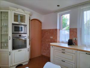 Kuchnia lub aneks kuchenny w obiekcie Sakura Studio Apartment