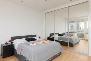 Posteľ alebo postele v izbe v ubytovaní Apartments The View by Noclegi Renters