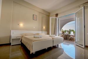 A bed or beds in a room at Chandris Apartments