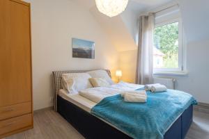 Ένα ή περισσότερα κρεβάτια σε δωμάτιο στο Apartament Regina