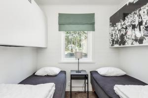 Voodi või voodid majutusasutuse Karlstad Swecamp Bomstadbaden toas