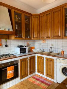 Dapur atau dapur kecil di Sognando Roma appartamento turistico +15 gambar
