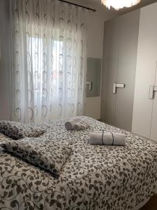 Postel nebo postele na pokoji v ubytování Casa Elodie