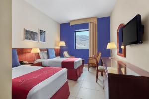 Postel nebo postele na pokoji v ubytování Makarem Al Bait Al Azizia Hotel + 31 fotografií