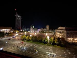 Nespecifikovaný výhled na destinaci Lipsko nebo výhled na město při pohledu z apartmánu + 2 fotografie