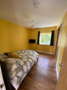 Postel nebo postele na pokoji v ubytování Appleacre Accommodation