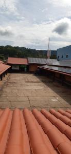 a roof of a building with solar panels on it at Dominique Hotel in Ouro Preto dʼOeste