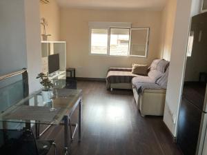 Zona d'estar a Precioso apartamento con terraza