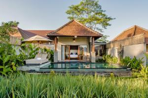 an image of a villa with a swimming pool at Poka Ubud Hidden Paradise & Spa by EPS in Ubud