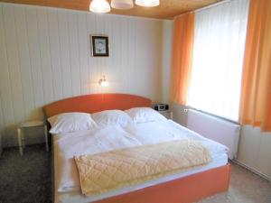 Postel nebo postele na pokoji v ubytování Ruegen_Fewo 58_1