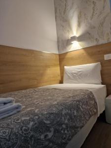 Cama o camas de una habitación en Hostal Esparteros