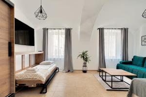 Ένα ή περισσότερα κρεβάτια σε δωμάτιο στο Apartament na parterze 40 m od rynku