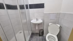 Koupelna v ubytování Hotel Rada