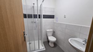 Koupelna v ubytování Hotel Rada