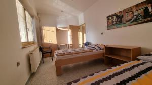 Postel nebo postele na pokoji v ubytování Hotel Rada