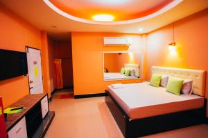 Säng eller sängar i ett rum på Windsor Resort