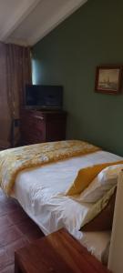 Postel nebo postele na pokoji v ubytování Hôtel de Mirmande
