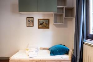 Posteľ alebo postele v izbe v ubytovaní Classic Florentine Flat Near Piazza Santa Croce