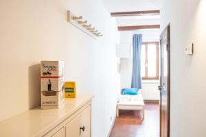 Posteľ alebo postele v izbe v ubytovaní Classic Florentine Flat Near Piazza Santa Croce