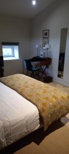 Postel nebo postele na pokoji v ubytování Hôtel de Mirmande