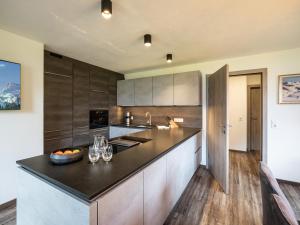 Kuchyň nebo kuchyňský kout v ubytování Zillertal Suites