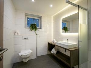 Koupelna v ubytování Zillertal Suites + 13 fotografií