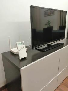 a television on top of a dresser at Apartamento Ibañez Martín in Mora de Rubielos +5 photos