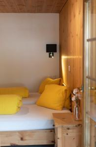Postel nebo postele na pokoji v ubytování Alpina Hotel-Apartments