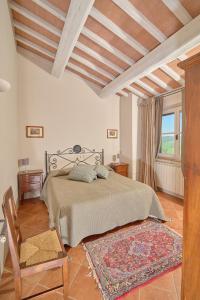 A bed or beds in a room at Il Poggio