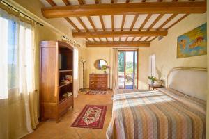 A bed or beds in a room at Il Poggio