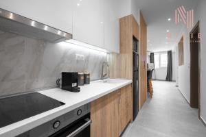 Kjøkken eller kjøkkenkrok på Bourn, Nilie Hospitality MGMT
