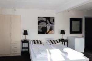 Postel nebo postele na pokoji v ubytování Skagen Hotel Annex