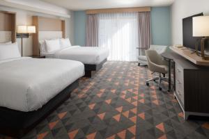 En eller flere senge i et værelse på Holiday Inn Portland - Columbia Riverfront, an IHG Hotel