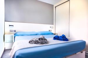 Postel nebo postele na pokoji v ubytování Sunshine San Valentin + 12 fotografií