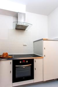 Majoituspaikan Comfy Apartment Dobra 54 keittiö tai keittotila