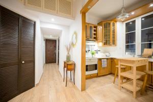 Kuchyňa alebo kuchynka v ubytovaní Apartamenty - MI Forest