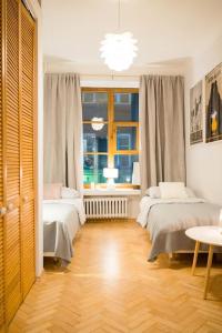 Posteľ alebo postele v izbe v ubytovaní Apartamenty - MI Forest