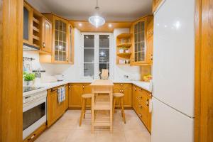 Kuchyňa alebo kuchynka v ubytovaní Apartamenty - MI Forest